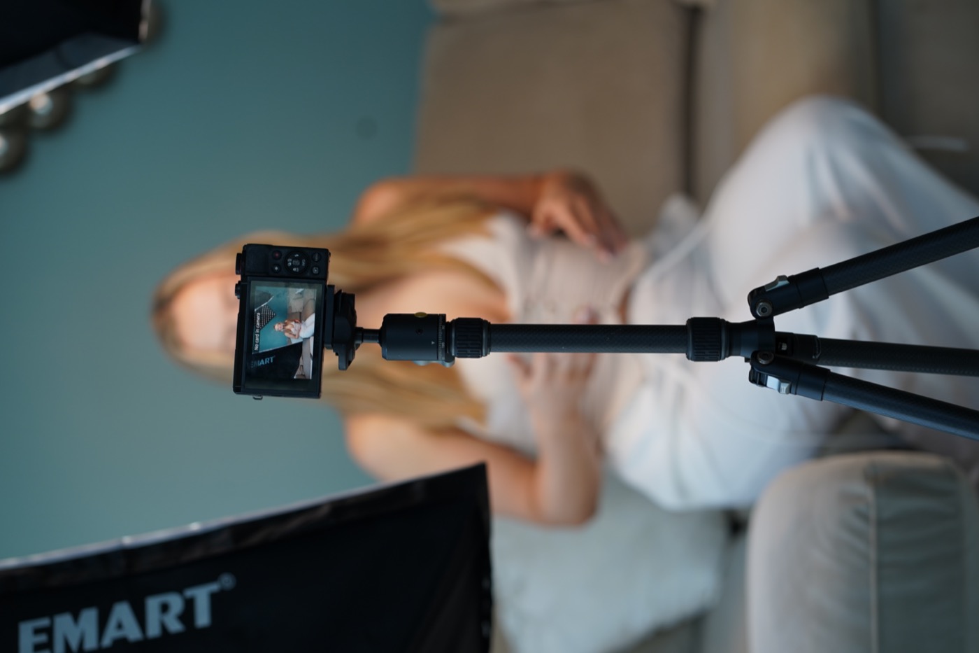Laoise Nugent filming content on set with a camera and tripod
