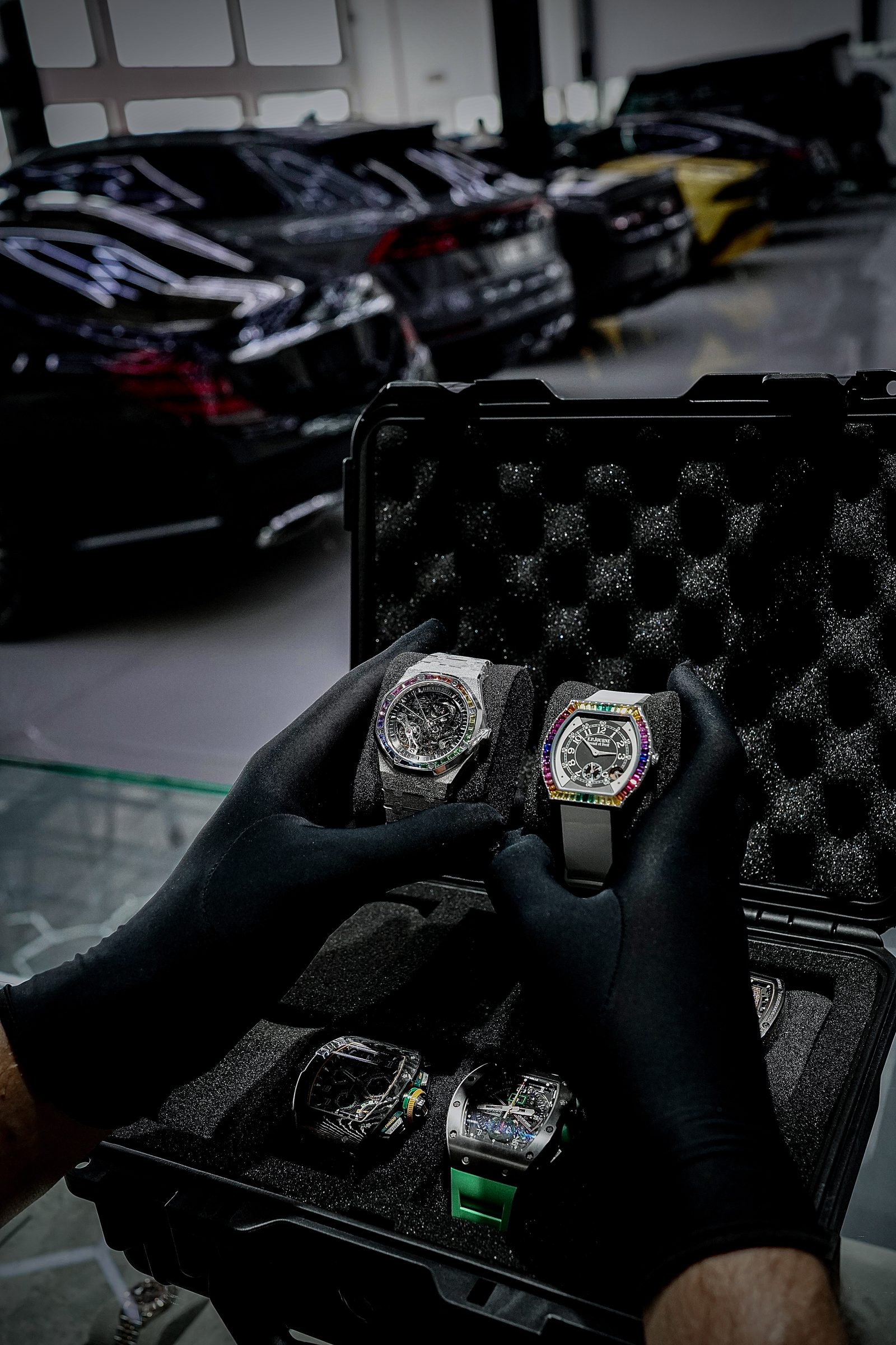 Watch collection being handled on set during the shoot
